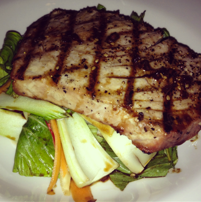 Char-grilled fresh Tuna steak served on pak choi and sugar snap pea salad with toasted sesame seeds, lime and soya dressing  